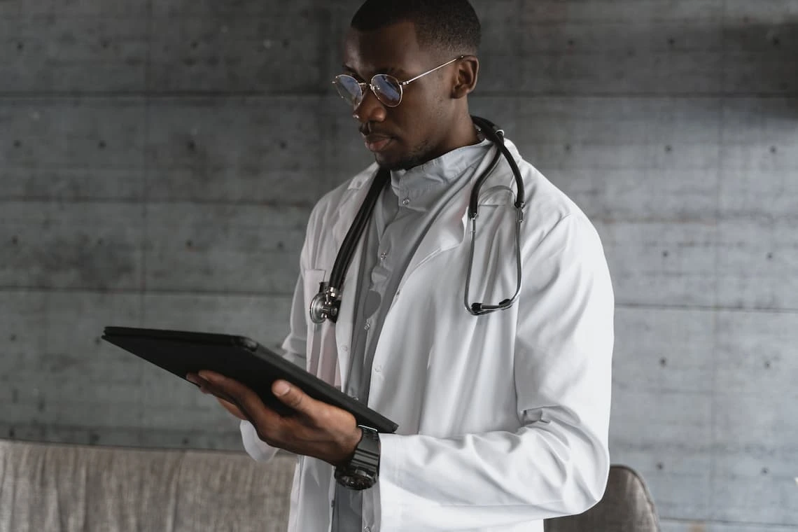 A doctor getting ready to proceed with the angiogram procedure.